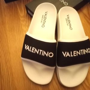 Brand new women's size 10 (European) size 8 (American) Valentino slides.